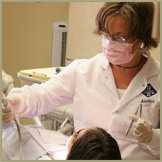 Cosmetic Dentist in Glebe, NSW preparing patient for dental implants and crown